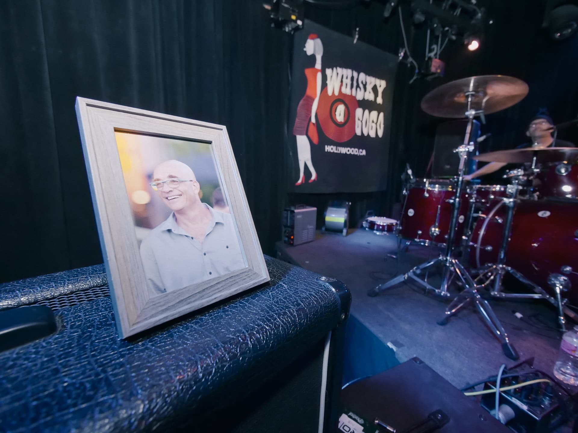 A framed portrait rests on an amplifier on the Whisky a Go Go stage.